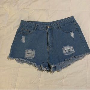 Distressed denim shorts